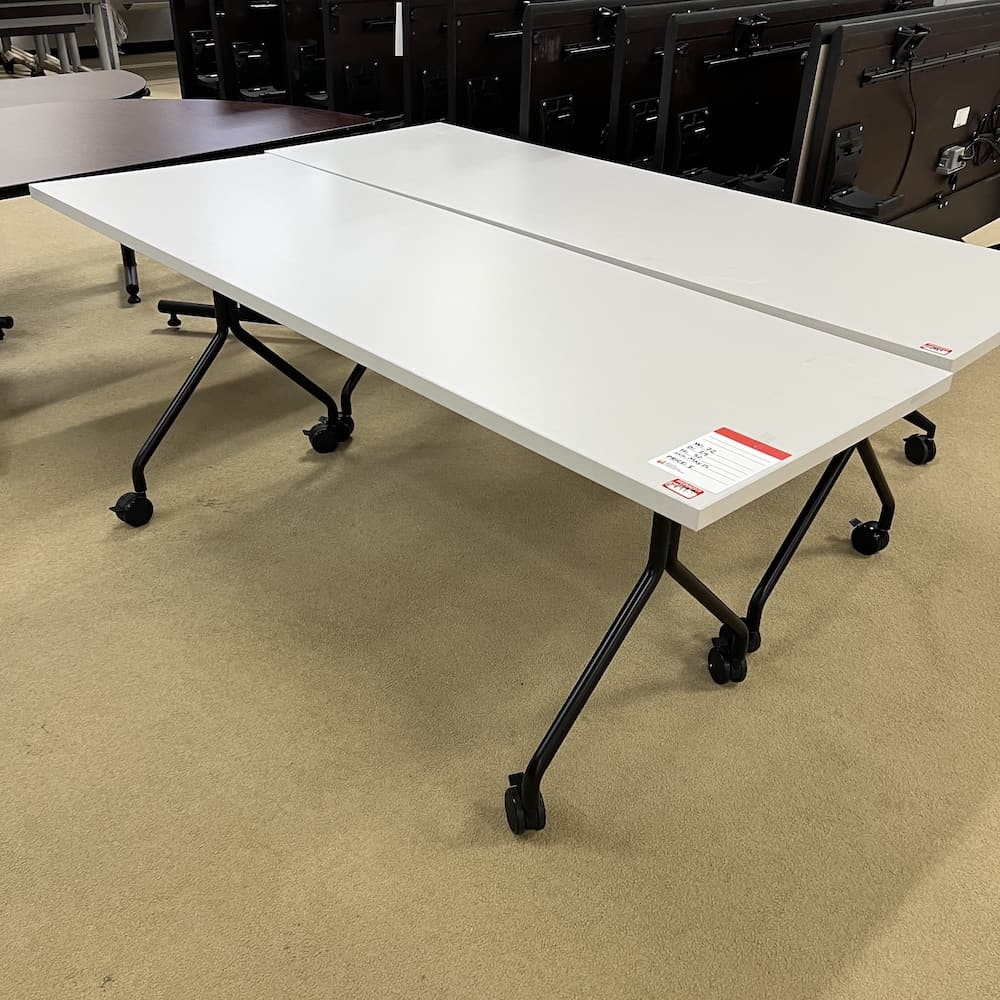 white training table with black legs, flip nest and roll, used office furniture