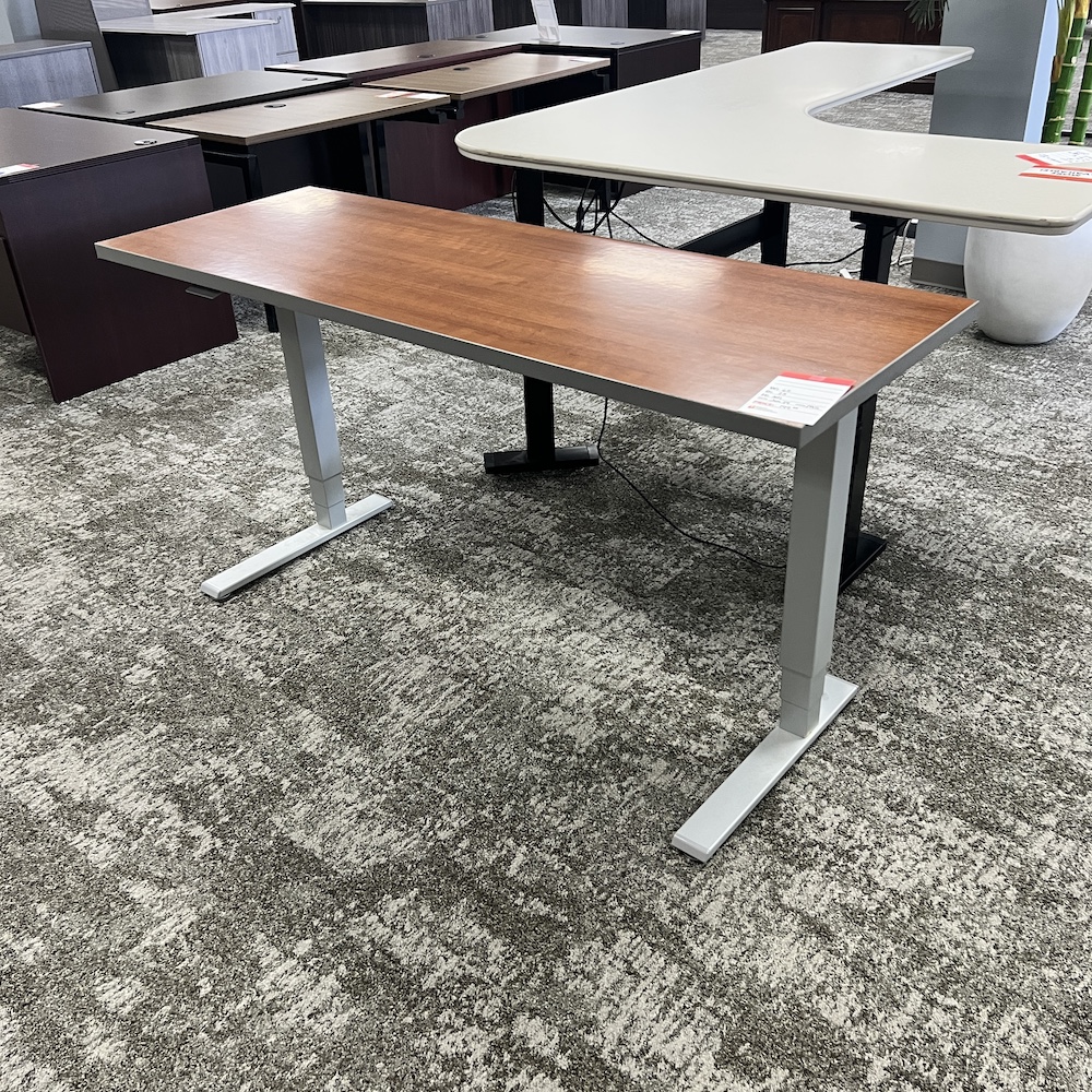Subscriber Special - 66" x 26" Humanscale Float Cherry Laminate and Grey Pneumatic Height Adjustable Standing Desk