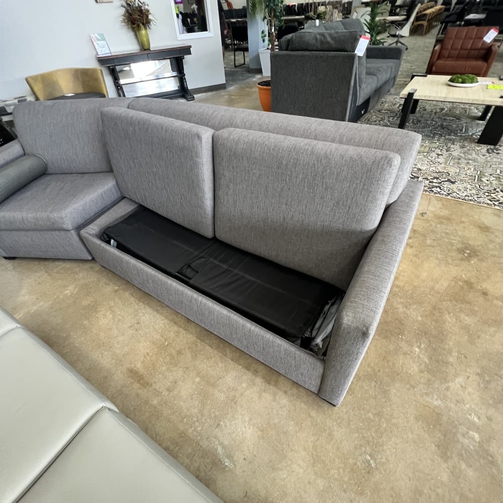 angled sofa sleeper, grey upholstery, used commercial hotel seating