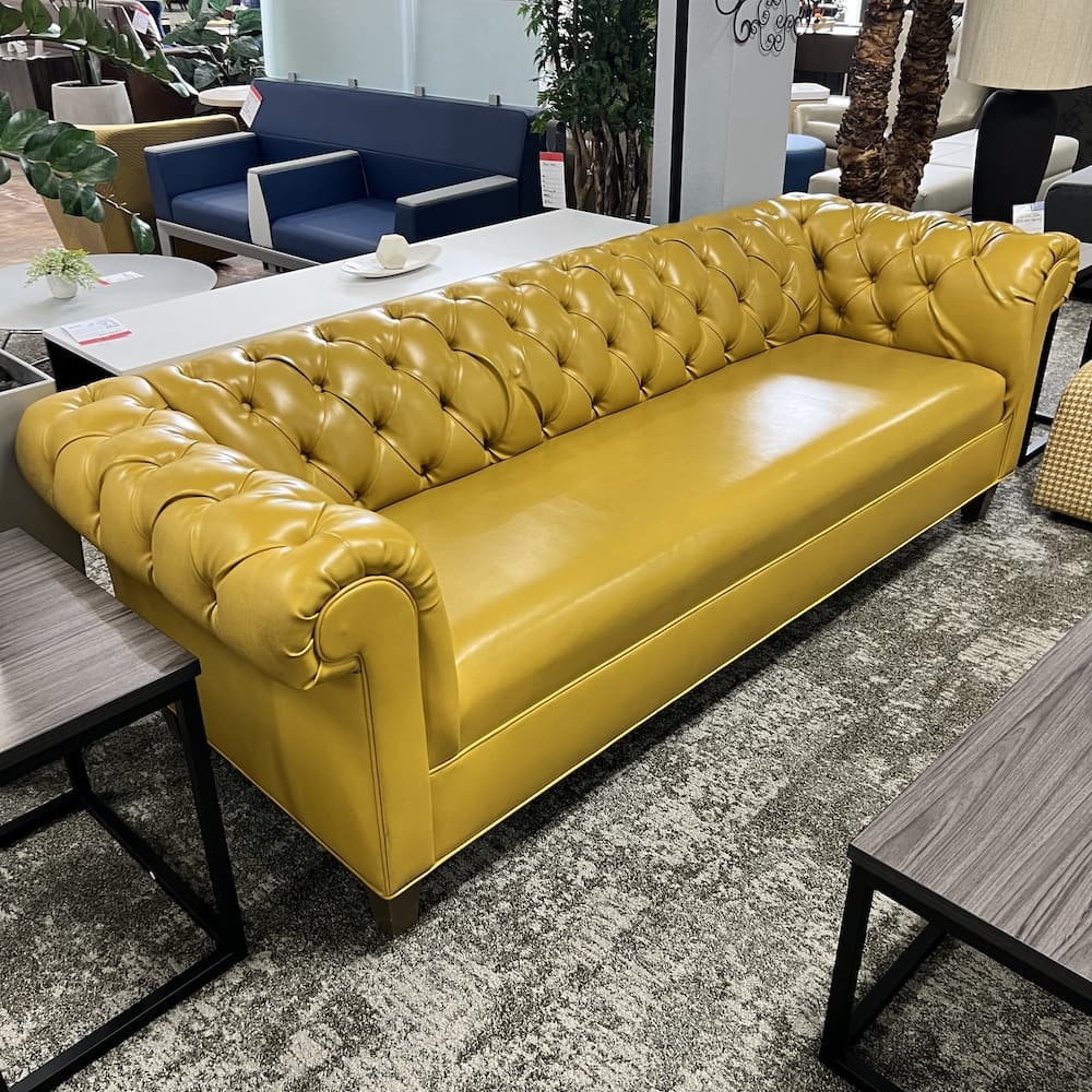 yellow vinyl tufted Chesterfield sofa couch, used commercial furniture