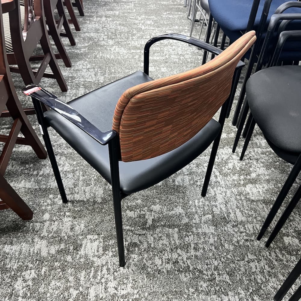 black vinyl and red upholstery back stacking chair, steelcase player, used office furniture