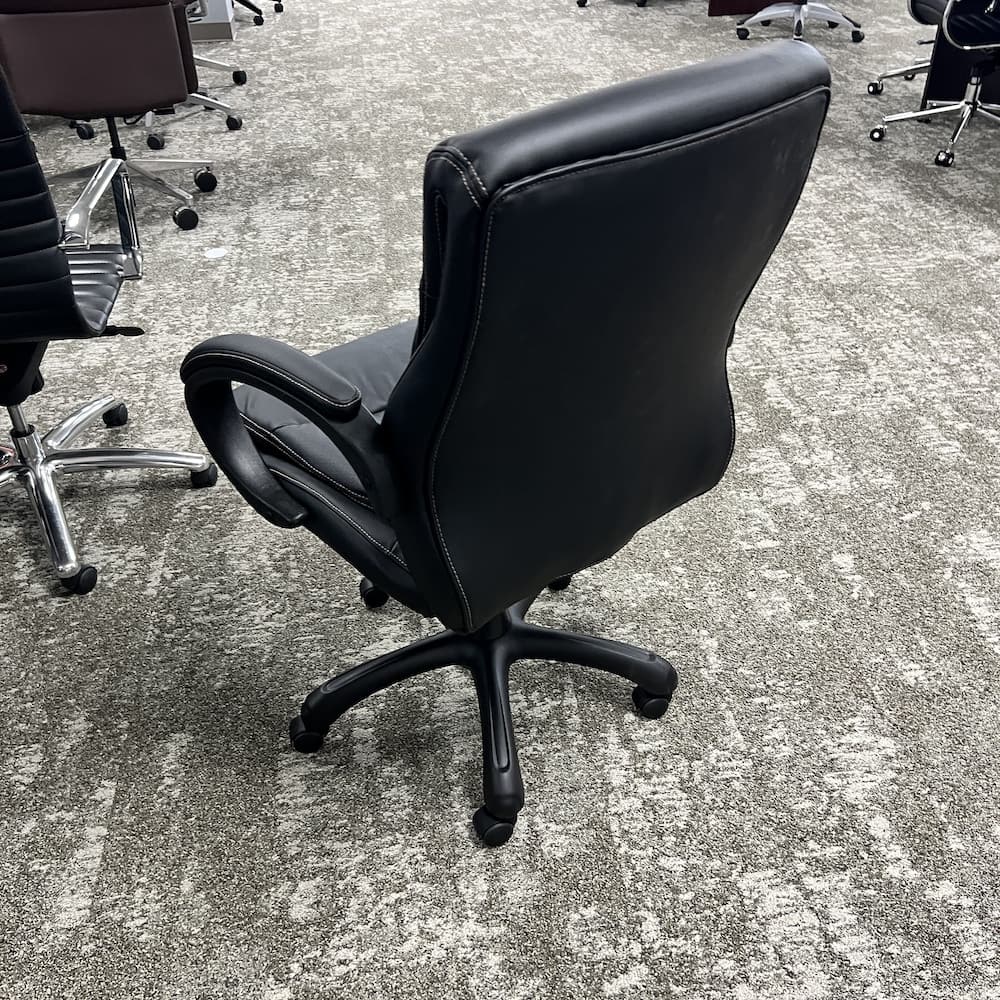 black padded mid back puffy vinyl conference chair, open box office furniture