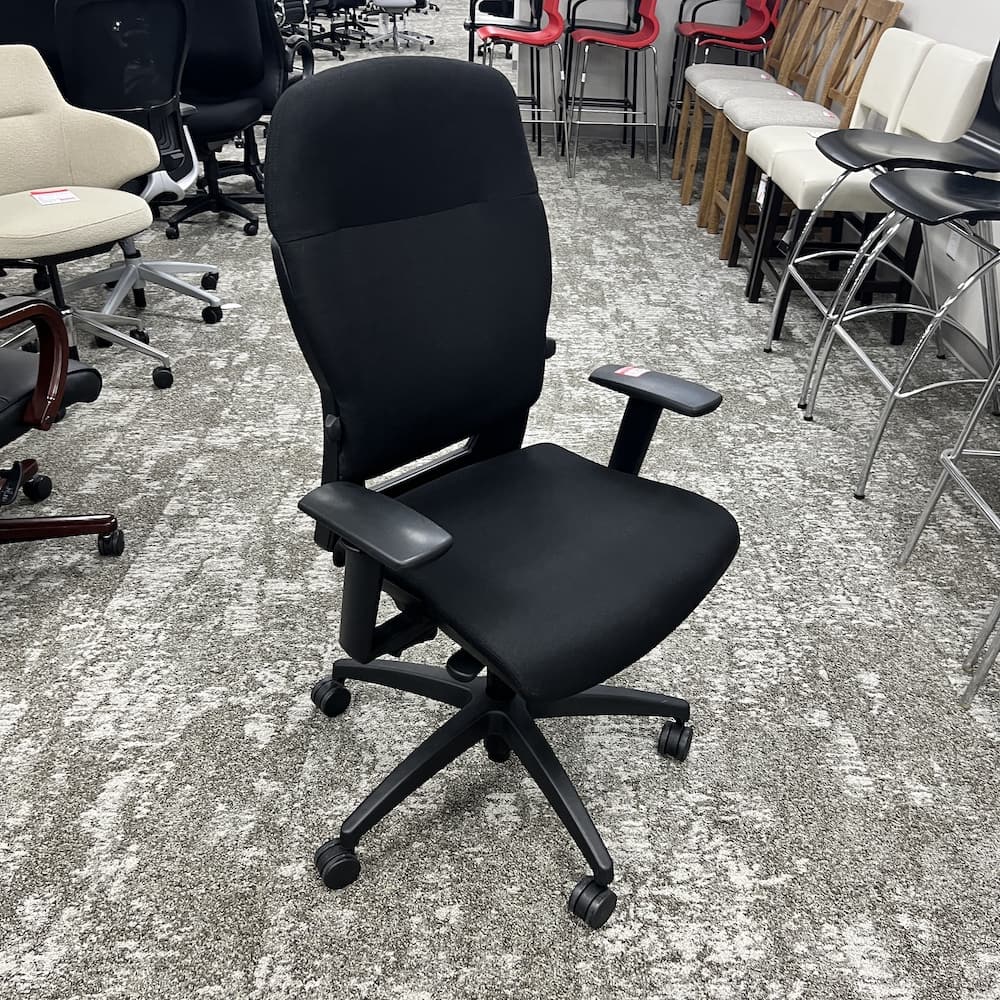 black upholstered teknion synchro tilt saver task chair, used office furniture