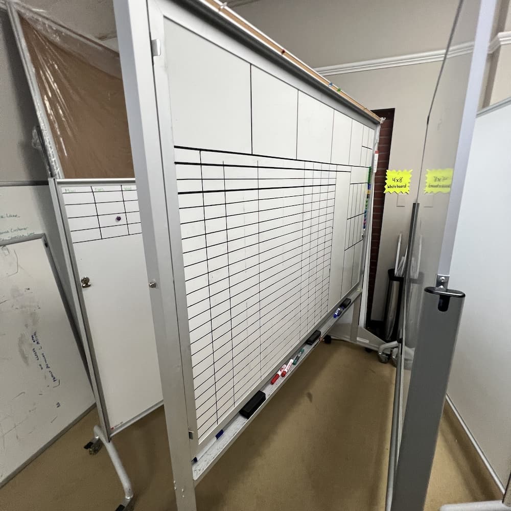 dry erase rolling white board with pin board, used office furniture
