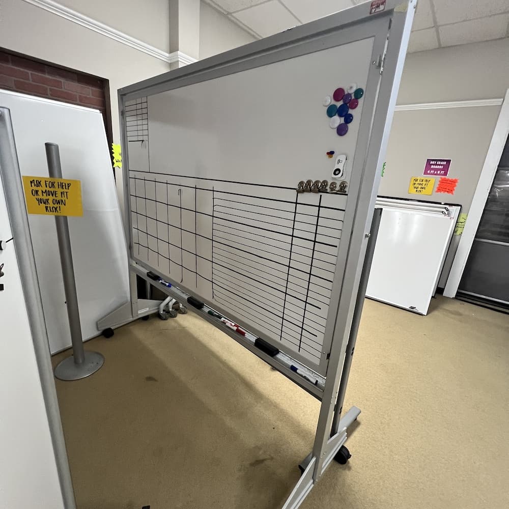 dry erase rolling white board with pin board, used office furniture