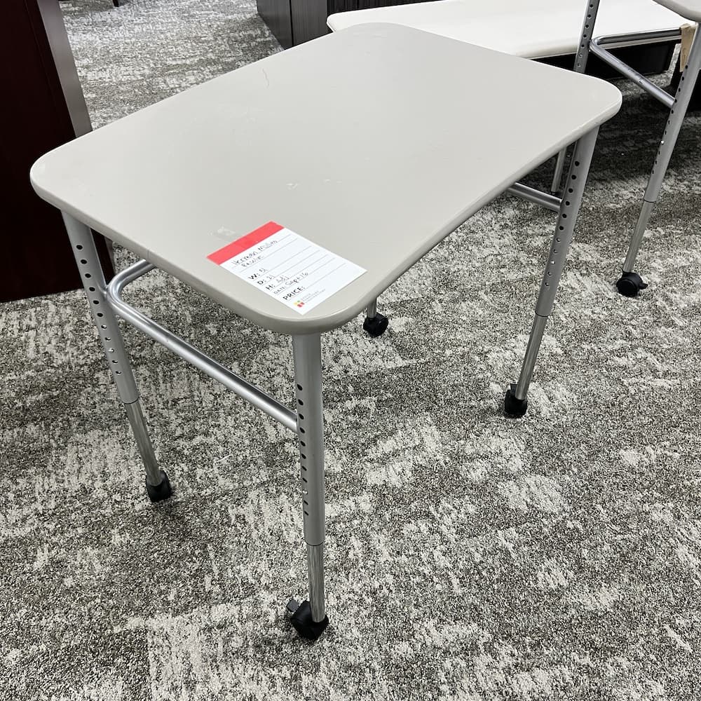 Herman miller rolling desk with adjustable legs, used office furniture