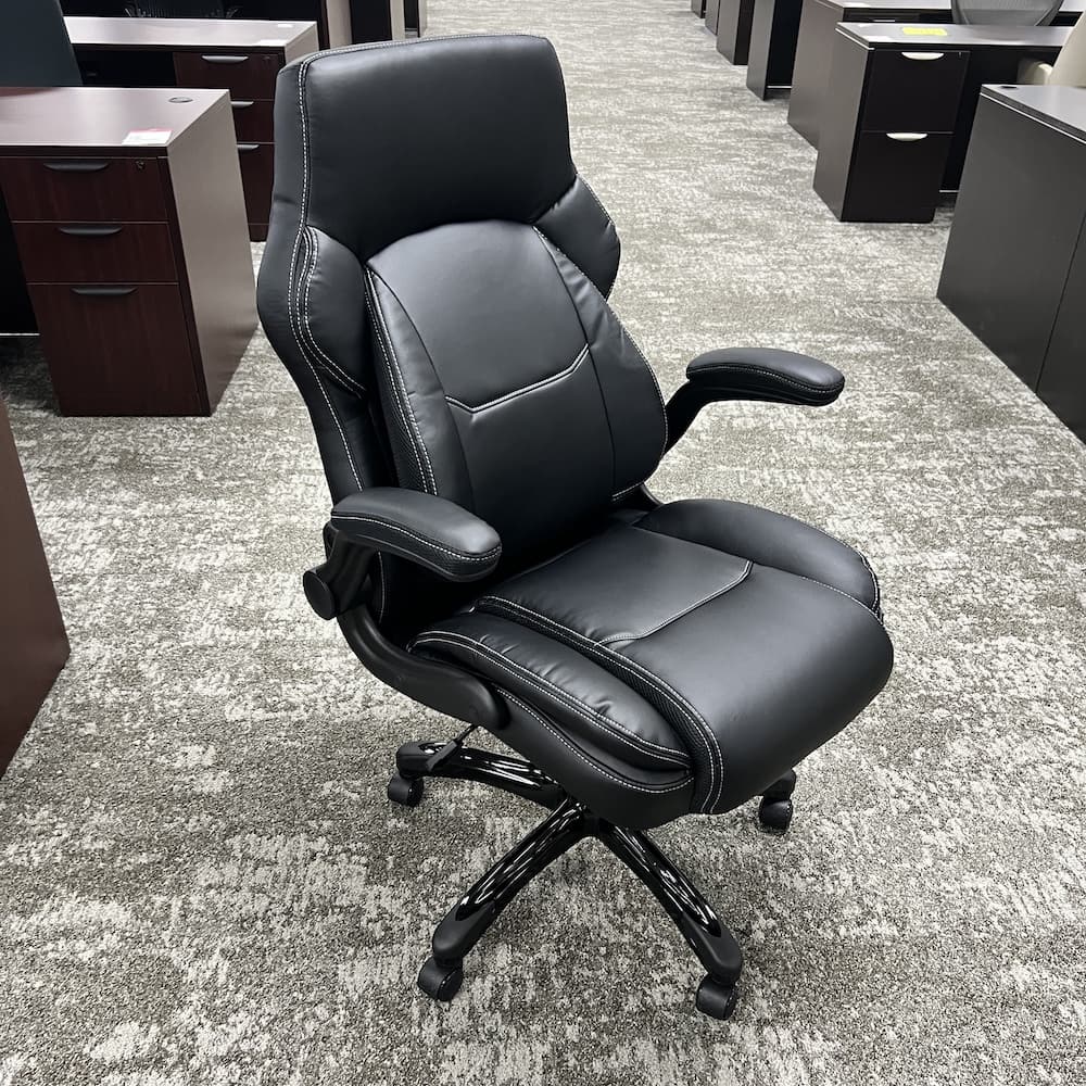 new producer chair, executive black vinyl, flip up arms, new office furniture