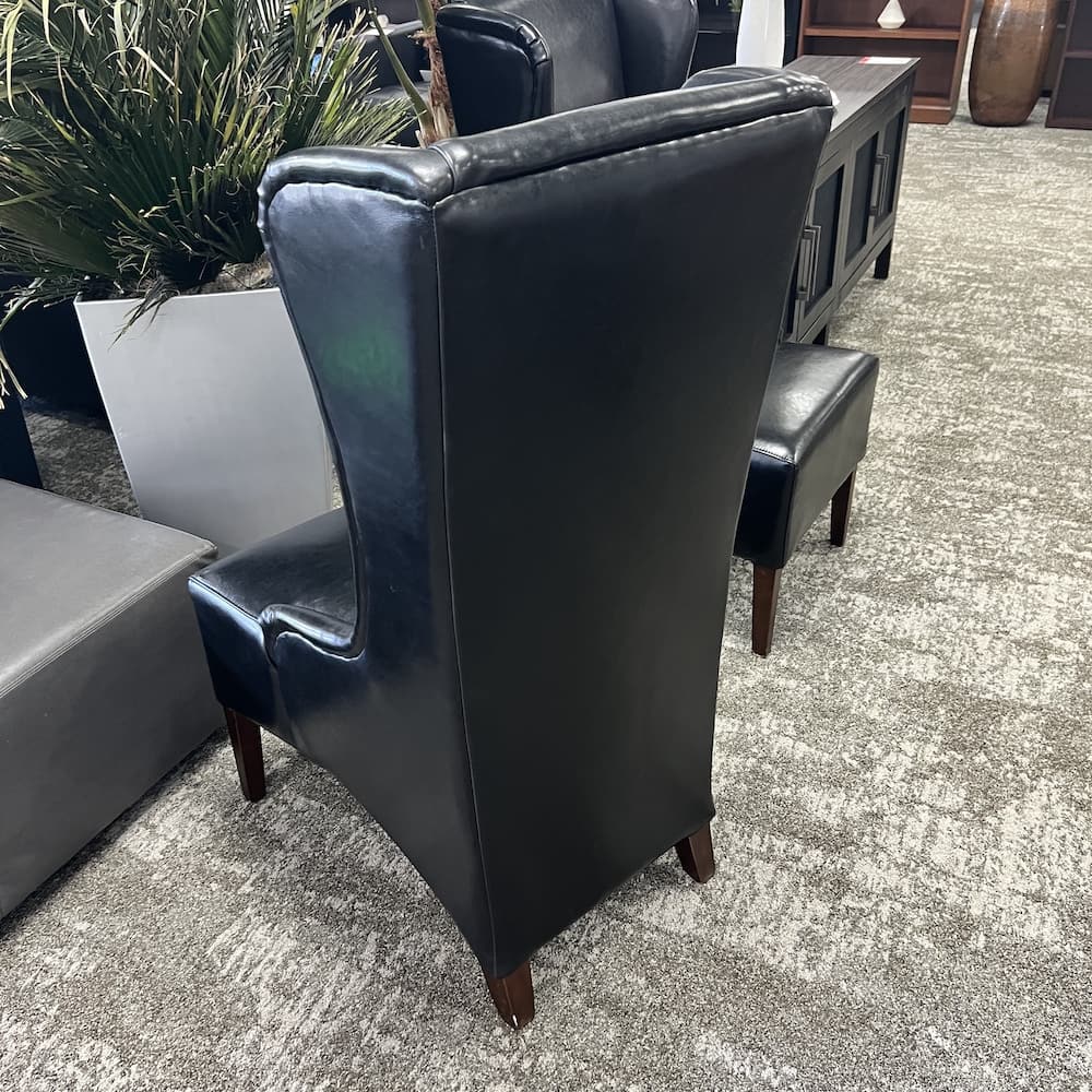 comfy high back wingback black vinyl lounge chair, used furniture