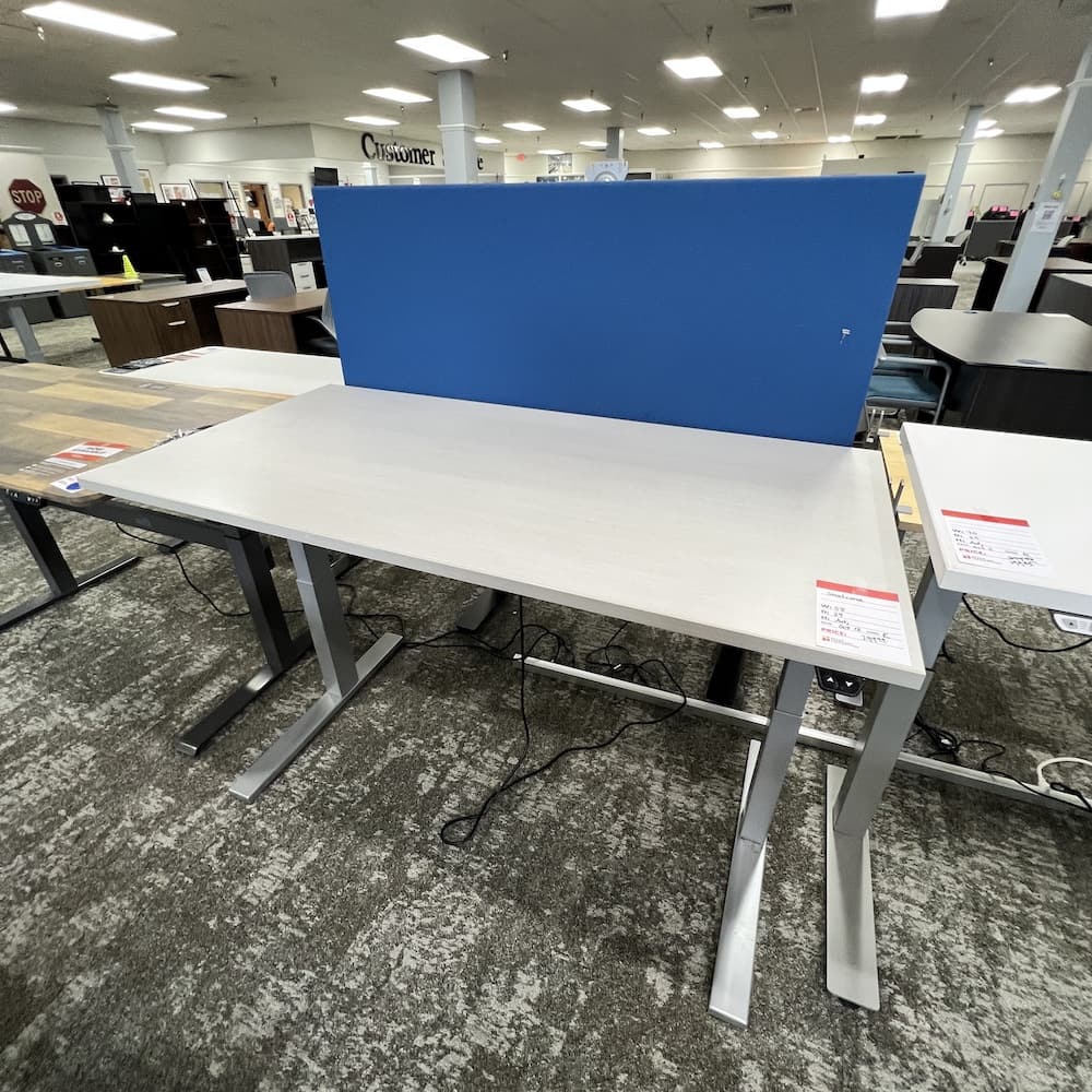 white wood look laminate height adjustable desk, blue privacy screen, grey base, used office furniture, 58x29