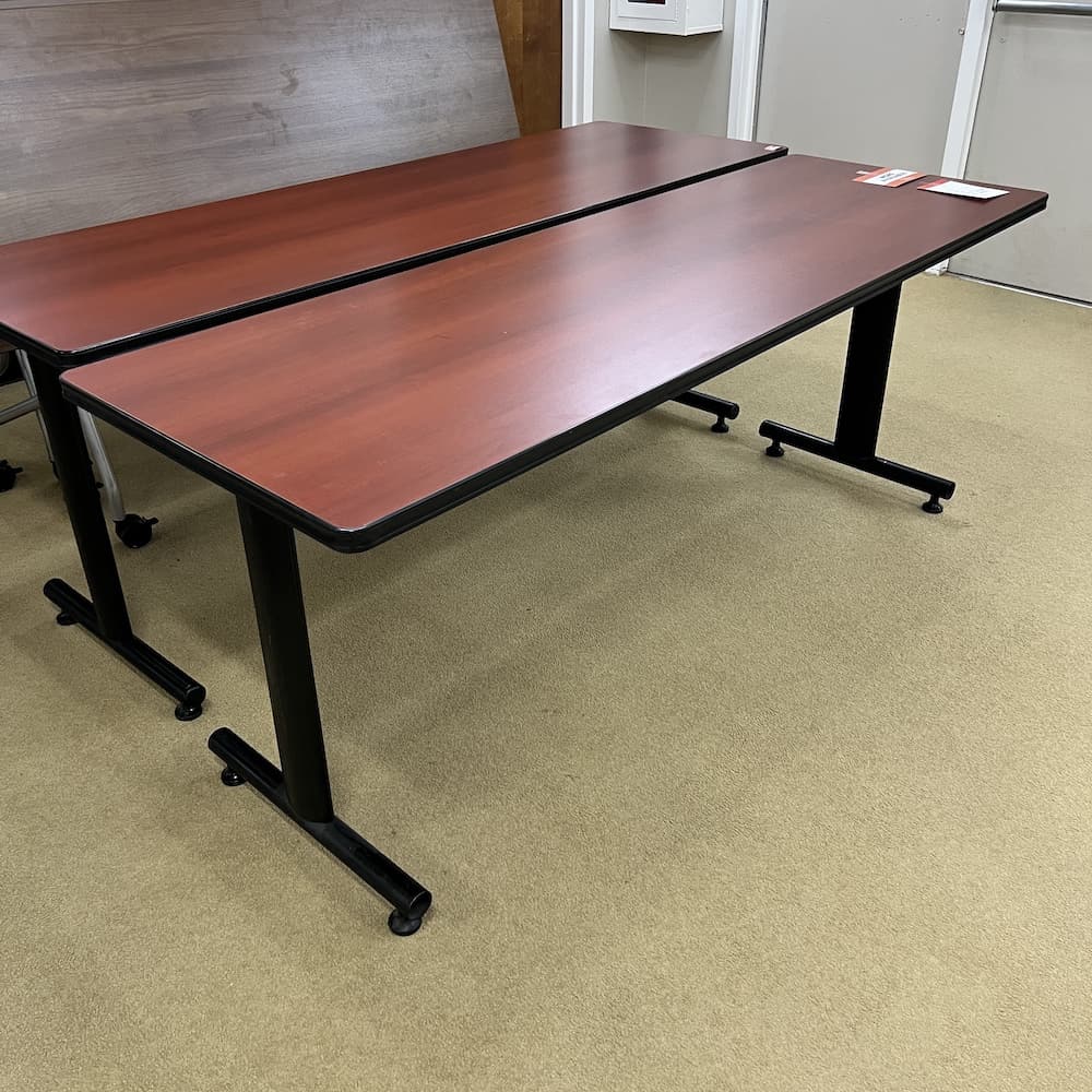 mahogany laminate training table with black base, used office furniture