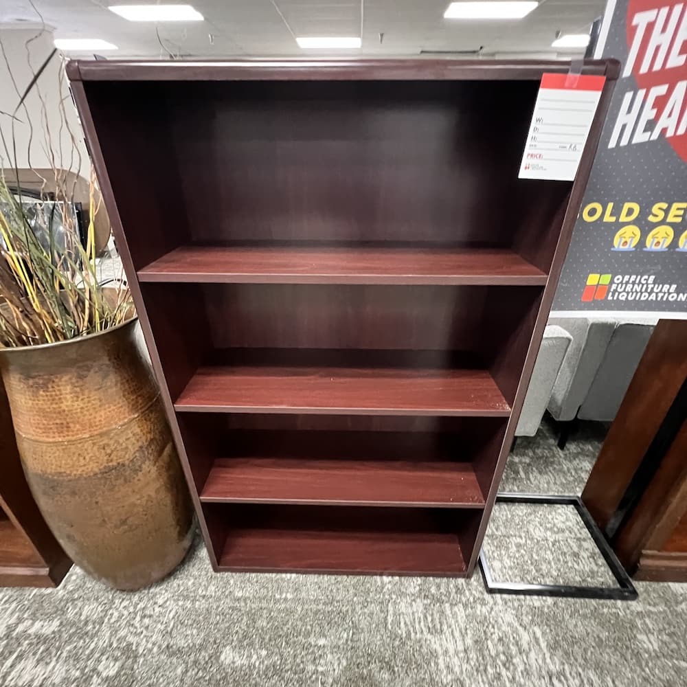mahogany laminate bookcase with rounded edges, 57" tall, used office furniture